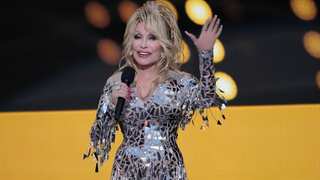 Dolly Parton says her preacher grandfather whipped her for fashion choices