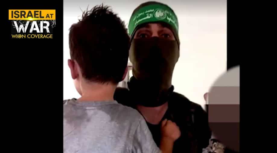 Hamas video shows fighters with captive Israeli children: Report Hamas video shows fighters with captive Israeli children: Report