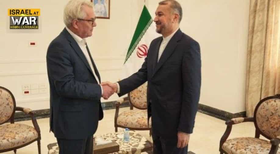 Israel envoy accuses UN of having 'blood on its hands' over Iran minister handshake Israel envoy accuses UN of having 'blood on its hands' over Iran minister handshake