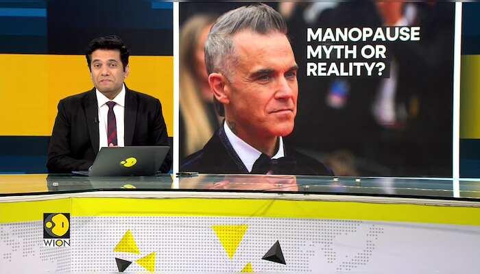 Robbie Williams claims he is currently experiencing 'Manopause'