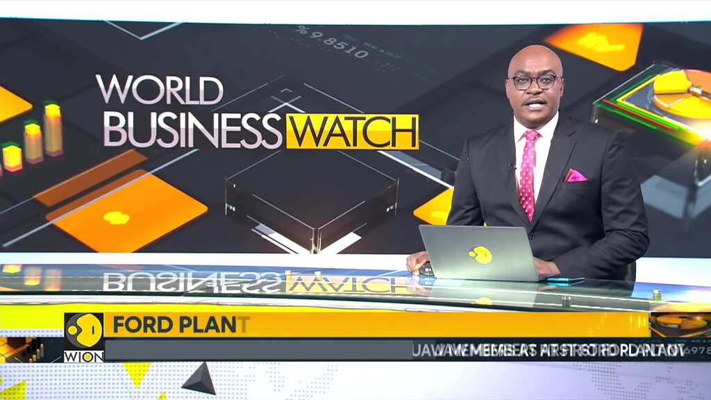 Auto workers strike: Ford and union agree record pay rise in tentative deal