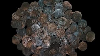 Italian divers unearth tens of thousands of ancient coins, possibly from 4th-century shipwreck