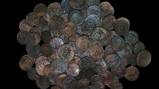 Italian divers unearth tens of thousands of ancient coins, possibly from 4th-century shipwreck