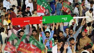 Pakistan: Imran Khan’s party says loss of election symbol part of ‘London plan’