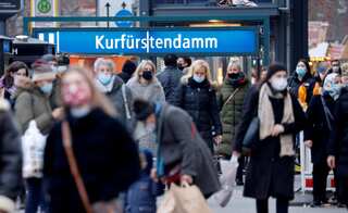 German unemployment inches upward in November amid economic strain
