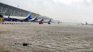 WATCH | Airport runway inundated, crocodile spotted on road as Cyclone Michaung causes mayhem in Chennai