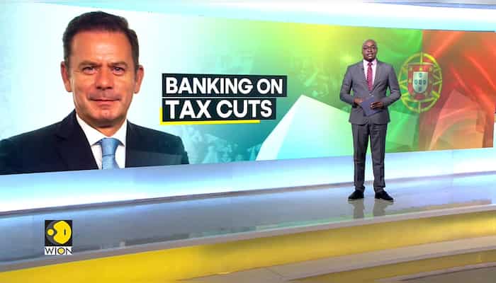 Portugal's PM contender banks on tax cuts to secure majority