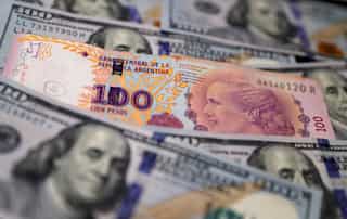 Argentina imposes limits on banks’ dollar holdings amid concerns over devaluation 