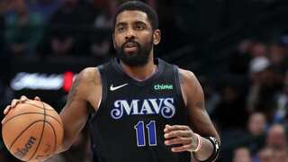 Mavericks guard Kyrie Irving reacts on injury sustained during win over Portland Trail Blazers