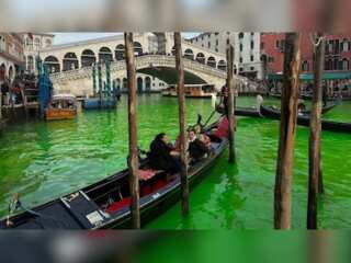 In Pics: Climate activists dye Venice's Grand Canal green in COP28 protest