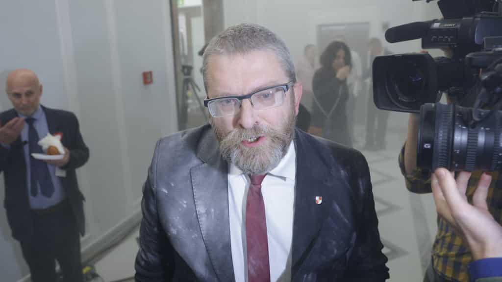 Video: Far-right Polish lawmaker uses fire extinguisher to put out Hanukkah candles