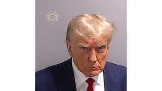 Trump NFT cards worth $99 each will get you scraps of suit he wore for his mug shot. Interested?