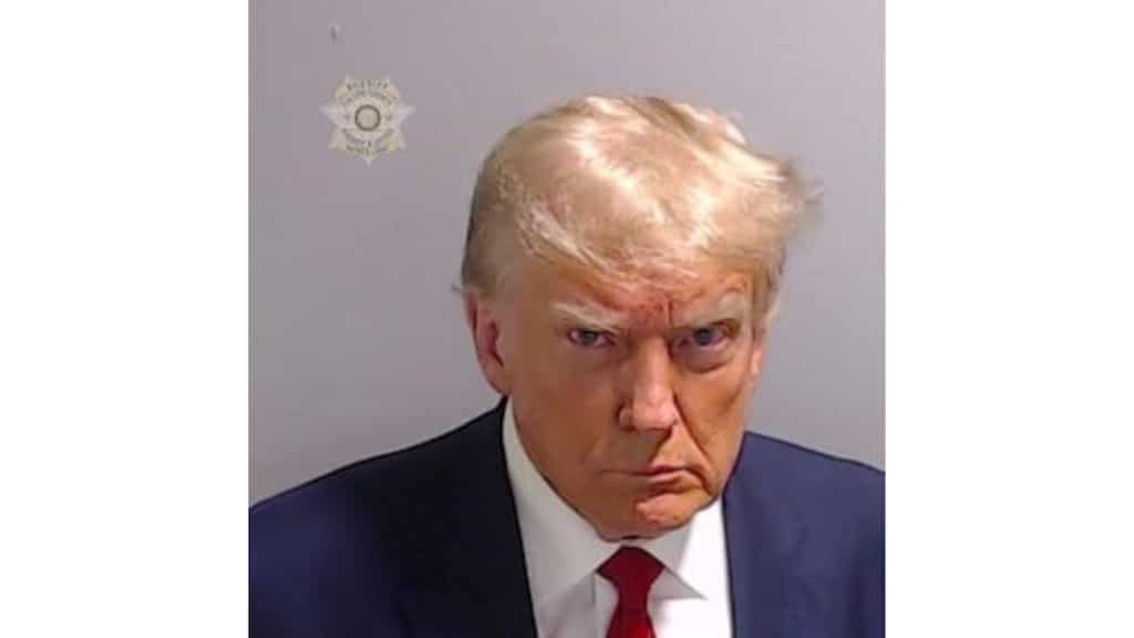 Trump NFT cards worth $99 each will get you scraps of suit he wore for his mug shot. Interested?