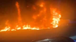 Video: Airplane makes emergency landing on US highway, catches fire