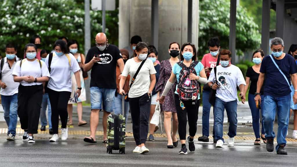Singapore witnesses record surge in number of Covid-19 cases, mask-mandate returns
