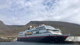 Norwegian cruise ship loses ability to navigate in North Sea after storm shatters windows