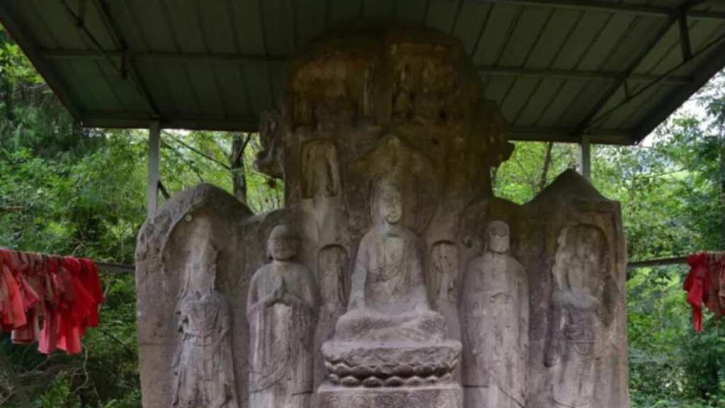 Ancient Buddha statues in China damaged after being painted over as mark of devotion