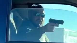 CAUGHT ON CAMERA! US Air Force Sergeant points gun at woman during road rage altercation, held