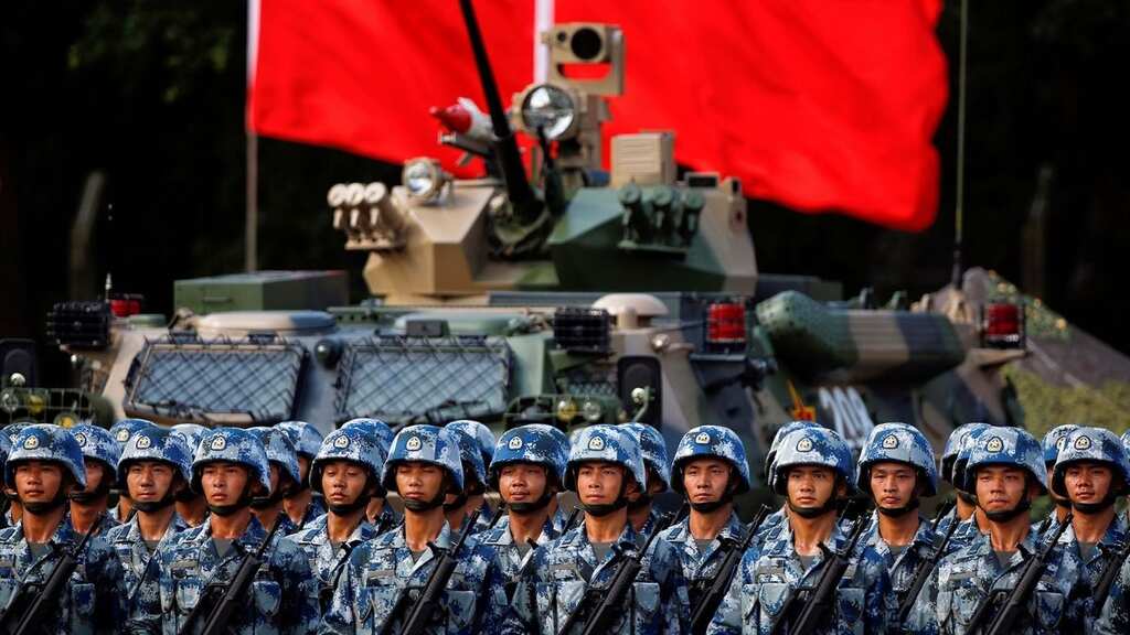China expels nine army officials from parliament in a sweeping reshuffle
