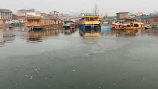 Kashmir Valley witnesses extreme cold wave conditions, Dal Lake partially frozen