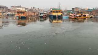Kashmir Valley witnesses extreme cold wave conditions, Dal Lake partially frozen