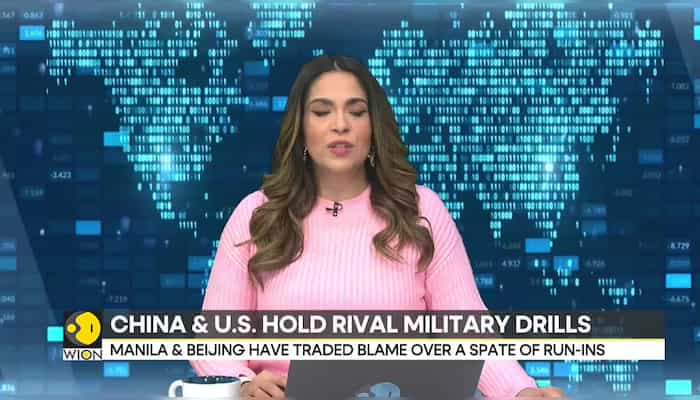 China & US hold rival military drills in disputed South China Sea
