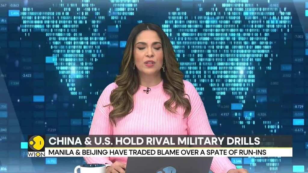China & US hold rival military drills in disputed South China Sea