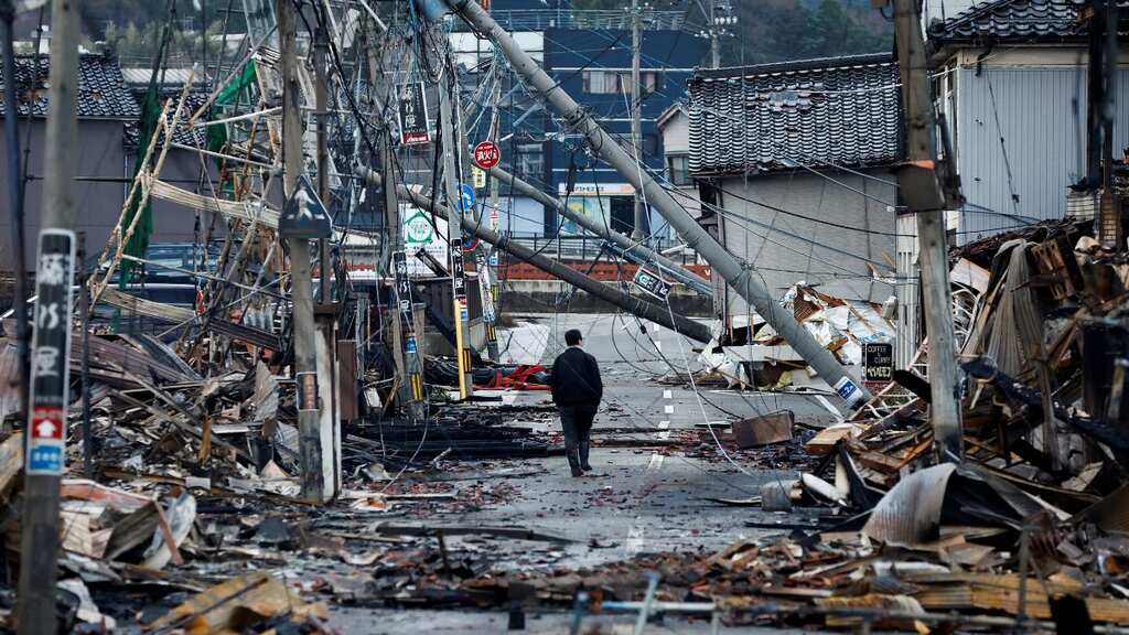 Miracle! Woman in her 90s pulled out of debris five days after Japan 7.6 earthquake