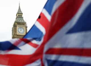 UK government urges councils to dip into reserves amid financial crisis concerns