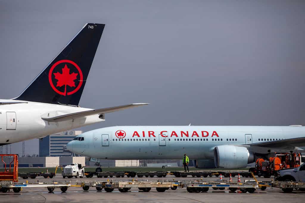 Passenger falls off Air Canada plane after opening cabin door, apprehended