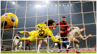Olivier Giroud magic helps ruthless AC Milan ease past AS Roma with 3-1 win