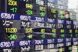 Asia stocks waver as China opts against rate cut: Report