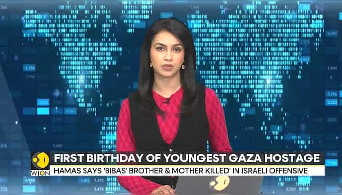 Protesters gather in Tel Aviv to mark first birthday of youngest Gaza hostage Kfir Biba