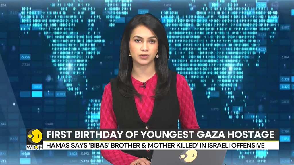 Protesters gather in Tel Aviv to mark first birthday of youngest Gaza hostage Kfir Biba