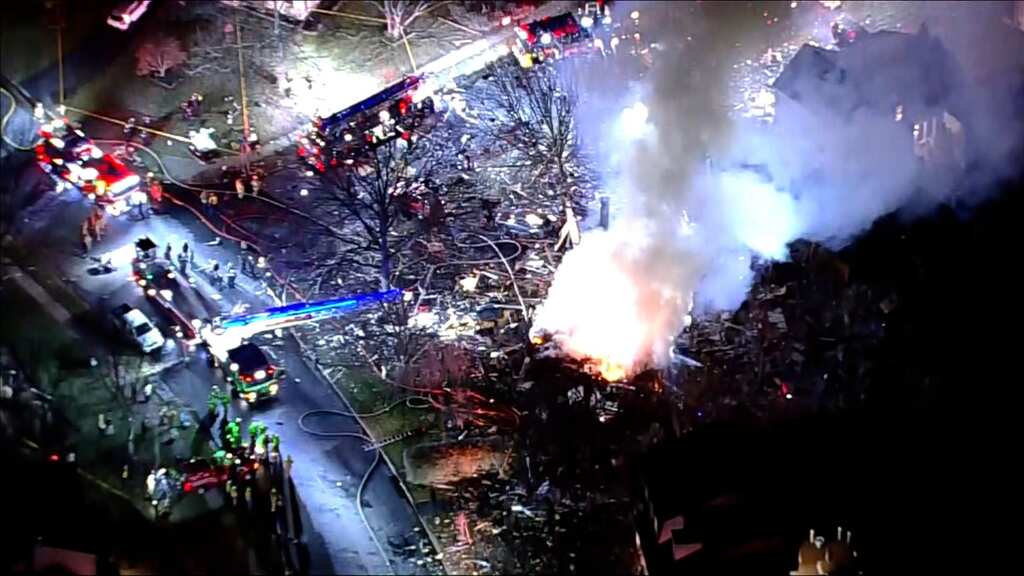 Video: Virginia home explodes with firefighters inside; one dead and 13 injured