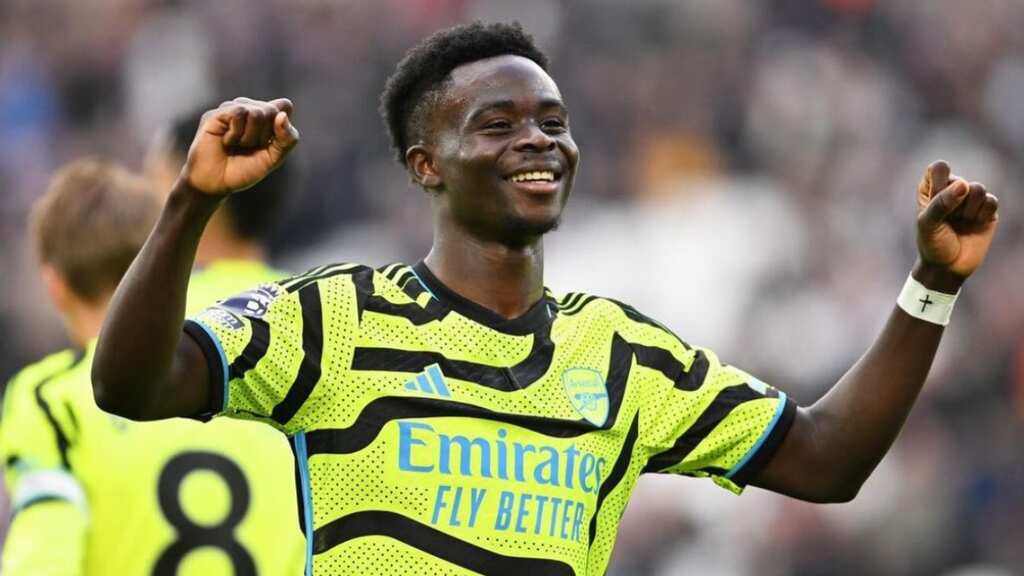 Premier League: Mohamed Salah scores in Liverpool return as Arsenal keep pressure on leaders