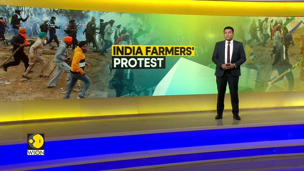 Indian farmers clash with police as they resume march to Delhi