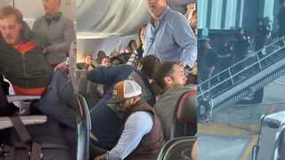 WATCH: Passenger duct-taped for attempting to open exit door on American Airlines flight