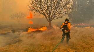Rainfall provides slight reprieve from Texas' largest-ever wildfire