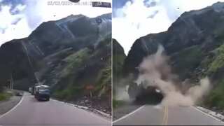 Video shows exact moment when massive boulders crushed two trucks in Peru