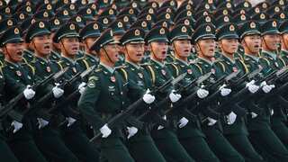 China to raise defence spending as Beijing adopts tougher language against Taiwan on reunification