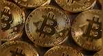 Bitcoin falls to 1-month low as jobs data sparks market volatility