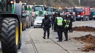 Czech farmers dump manure in front of government offices, block Prague streets in renewed protests