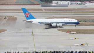 80-year-old Chinese flyer detained for throwing 'good luck' coins in airplane engine