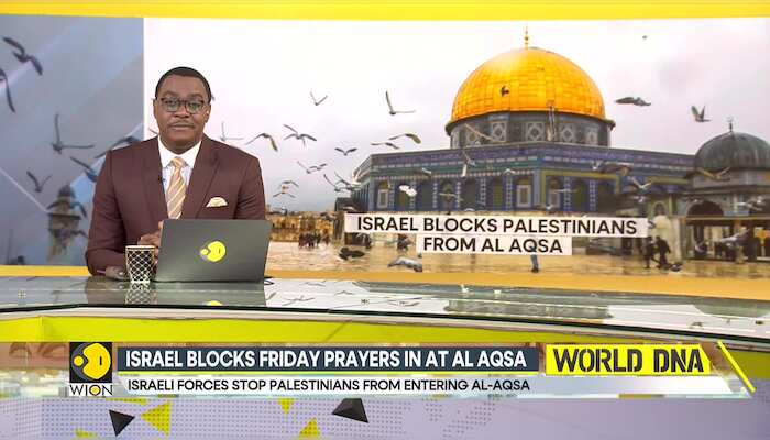 Israel blocks Friday prayers at Al-Aqsa, Palestinians pray on the streets