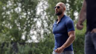 Influencer Andrew Tate, brother detained in Romania, handed UK arrest warrant