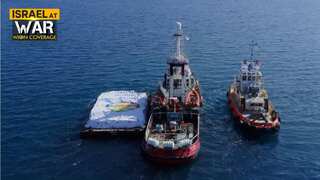 EU urges Israel to open crossings as aid ship nears Gaza; Israel says will 'flood' area with humanitarian aid