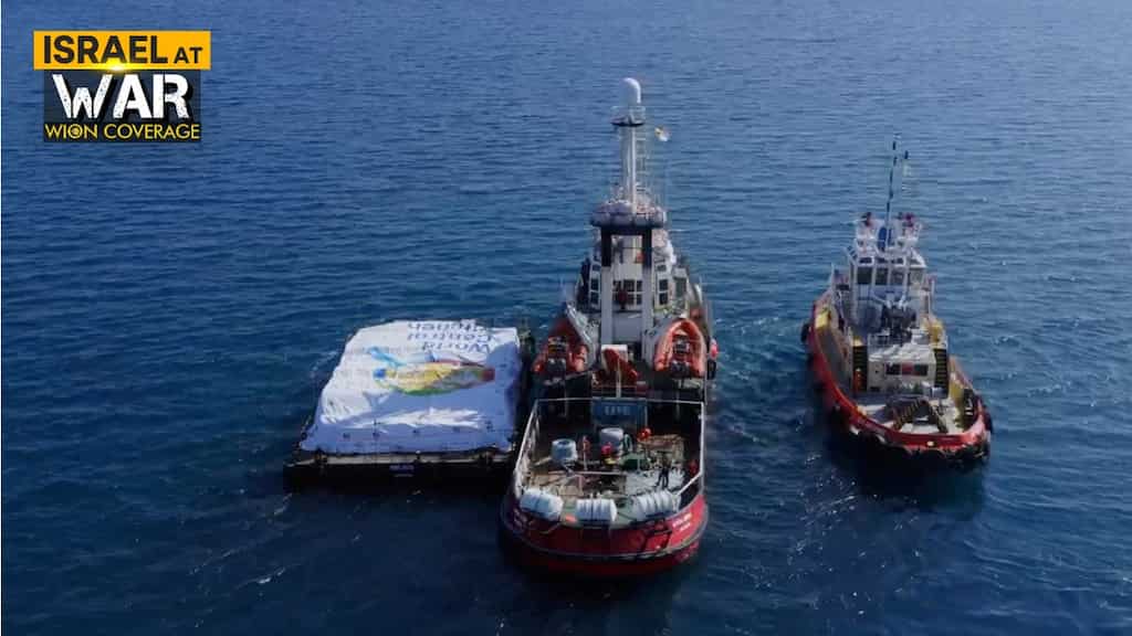 EU urges Israel to open crossings as aid ship nears Gaza; Israel says will 'flood' area with humanitarian aid