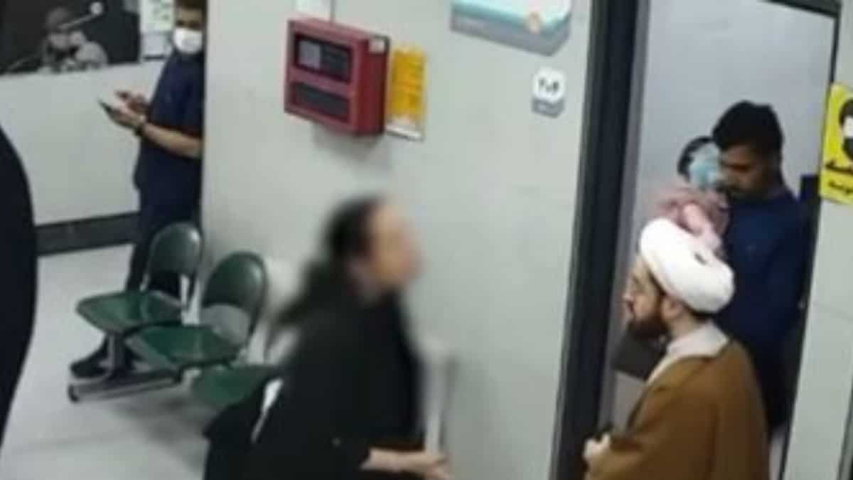 Watch: Iranian woman without hijab gets into a scuffle with cleric for clicking her picture