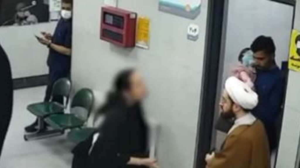 Watch: Iranian woman without hijab gets into a scuffle with cleric for clicking her picture
